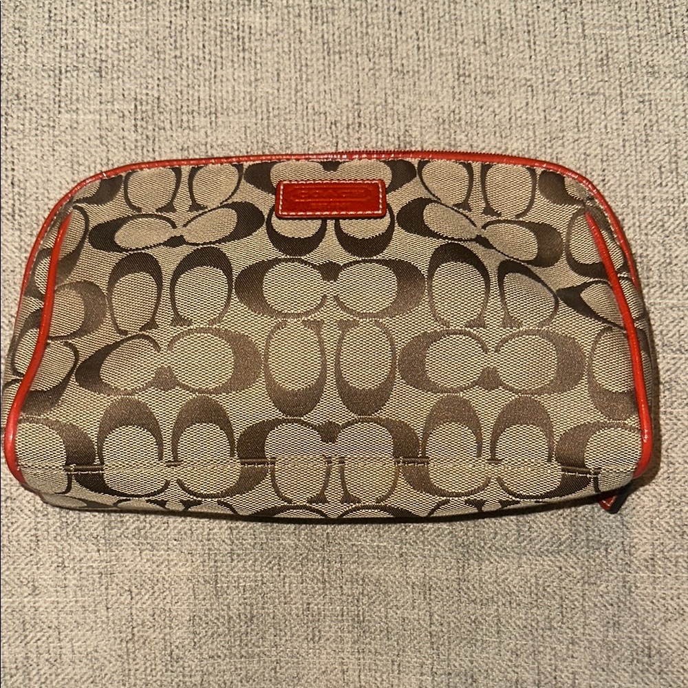 Coach Tan and Orange Monogram Clutch